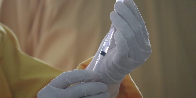 Does smoking affect the antibodies level induced by Covid-19 vaccine?