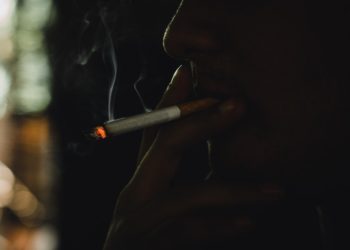 New english cohort study: fewer Covid-19 hospitalization among smokers and studies on the role of nicotine